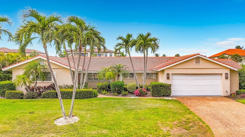 Located within the coveted Country Club Shores community of - Beach Home for sale in Longboat Key, Florida on Beachhouse.com