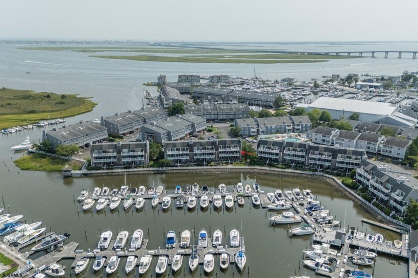 The highly coveted WATERFRONT unit at Harbour Cove! Meticulously - Beach Condo for sale in Somers Point, New Jersey on Beachhouse.com