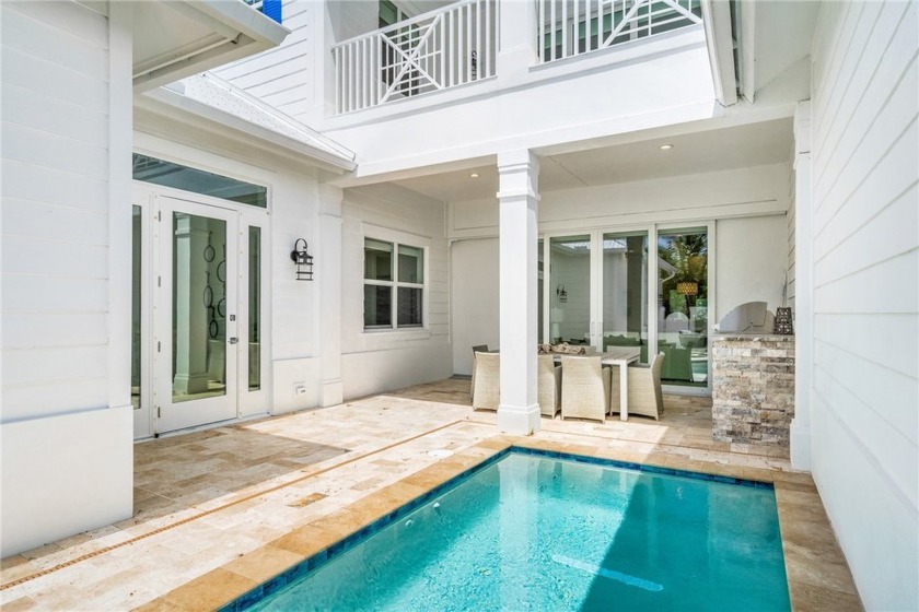 A modern twist on Key West style, this luxury cottage beckons - Beach Townhome/Townhouse for sale in Vero Beach, Florida on Beachhouse.com