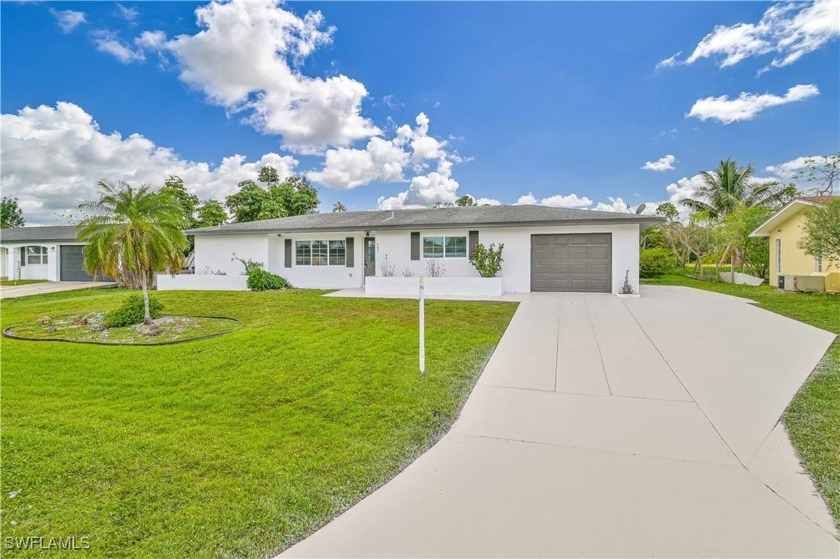 Welcome to this Stunning renovated Pool home in central Lehigh - Beach Home for sale in Lehigh Acres, Florida on Beachhouse.com