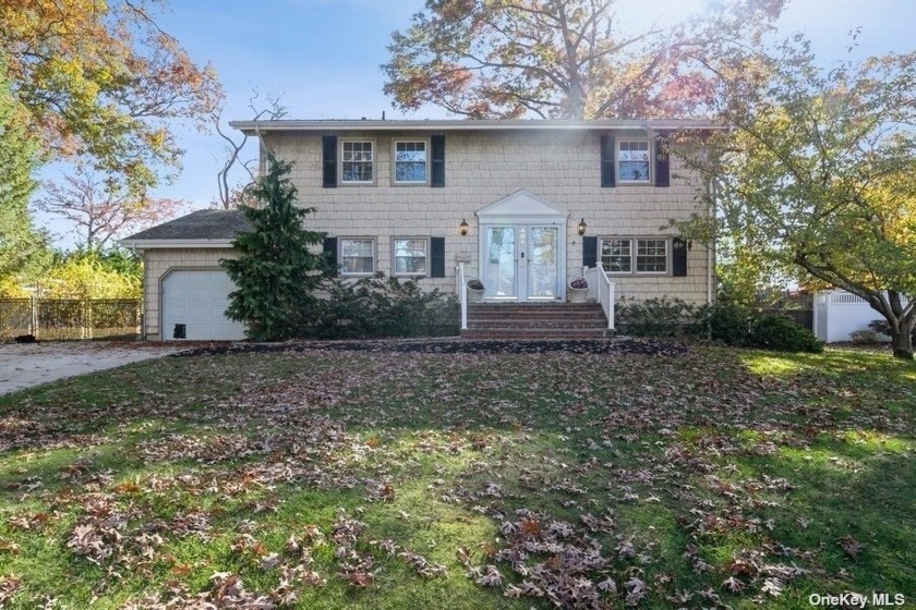 Spacious 4 bedroom, 2.5 bath Colonial in a charming residential - Beach Home for sale in West Babylon, New York on Beachhouse.com