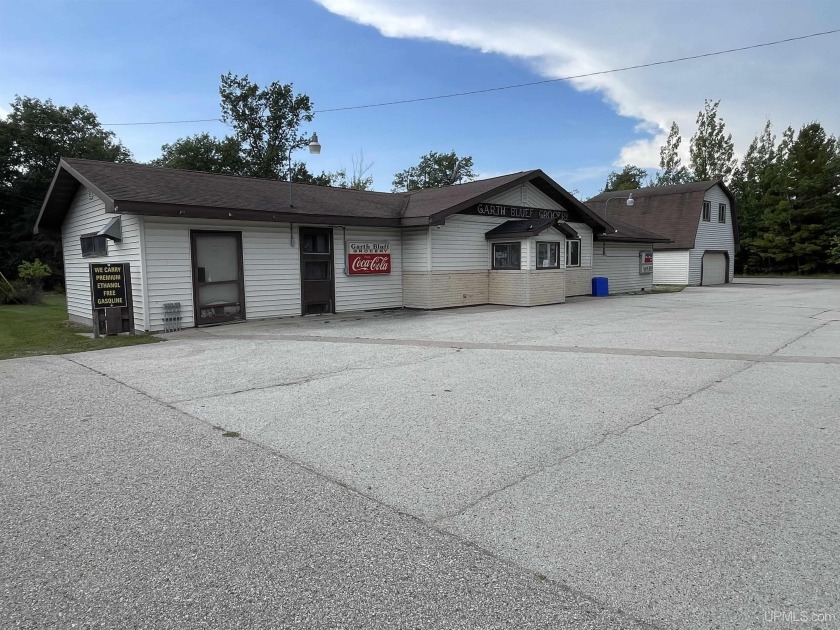 Located in Michigan's Upper Peninsula just a  1/2  mile from US - Beach Home for sale in Rapid River, Michigan on Beachhouse.com