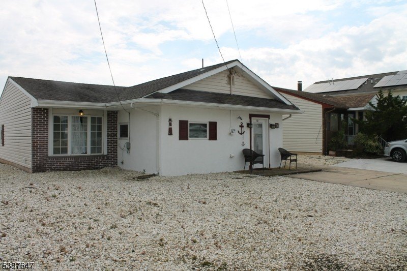 A boater's dream this quaint cozy three-bedroom ranch nested in - Beach Home for sale in Little Egg Harbor, New Jersey on Beachhouse.com