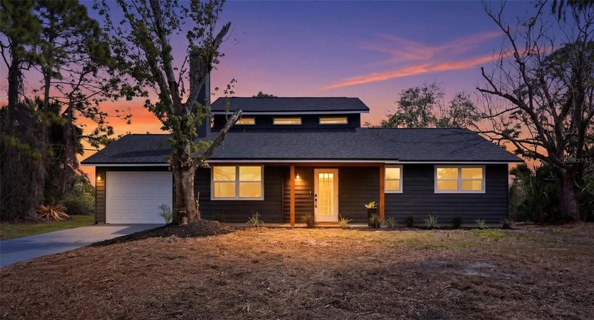 One-of-a-Kind Fully Renovated 2-Story Cabin-Style Home on a Huge - Beach Home for sale in North Port, Florida on Beachhouse.com