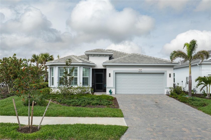 Discover refined coastal living in this exquisitely appointed - Beach Home for sale in Englewood, Florida on Beachhouse.com