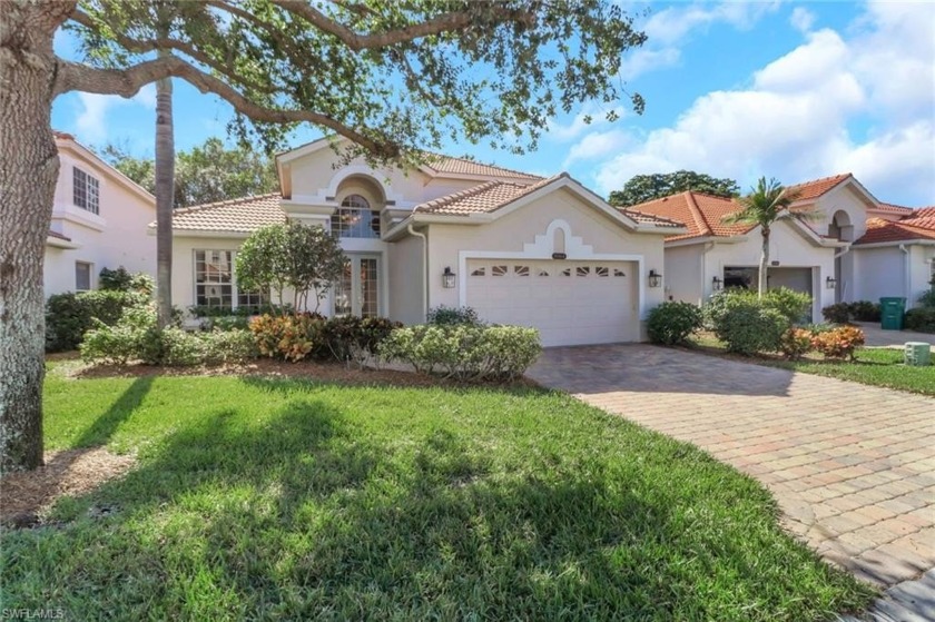 Indulge and embrace the Pelican Marsh lifestyle in this - Beach Home for sale in Naples, Florida on Beachhouse.com