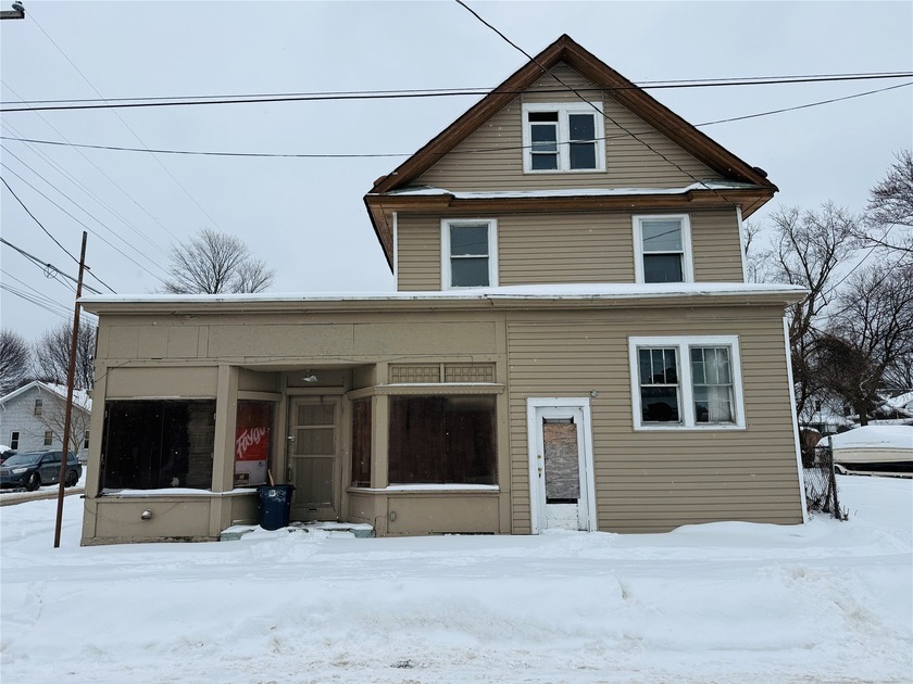 Attention investors and contractors! This 2 unit, with an - Beach Home for sale in Erie, Pennsylvania on Beachhouse.com