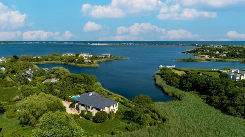 Nestled on the coveted Cobb Isle in Water Mill, this exceptional - Beach Home for sale in Water Mill, New York on Beachhouse.com