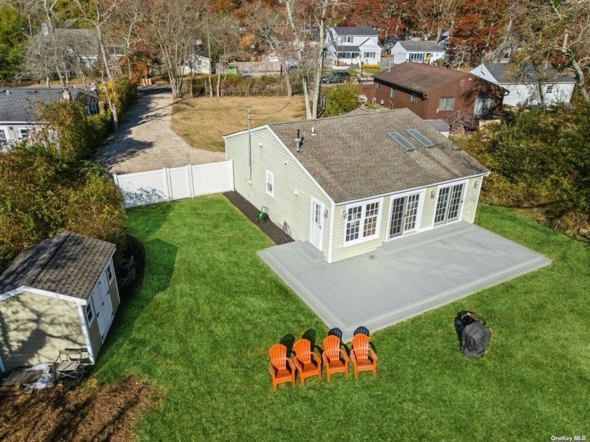 Welcome to your dream lakefront home, perfectly situated on - Beach Home for sale in East Patchogue, New York on Beachhouse.com