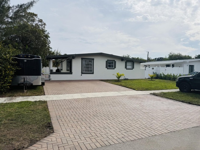 Charming 3-bedroom, 2-bath home in the heart of Palm Springs - Beach Home for sale in Palm Springs, Florida on Beachhouse.com