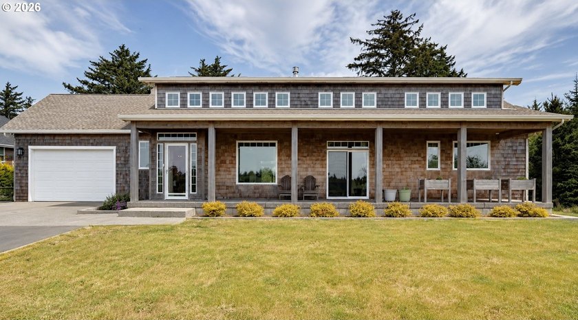 Custom built by local builder Ackley Homes, this exceptional - Beach Home for sale in Warrenton, Oregon on Beachhouse.com