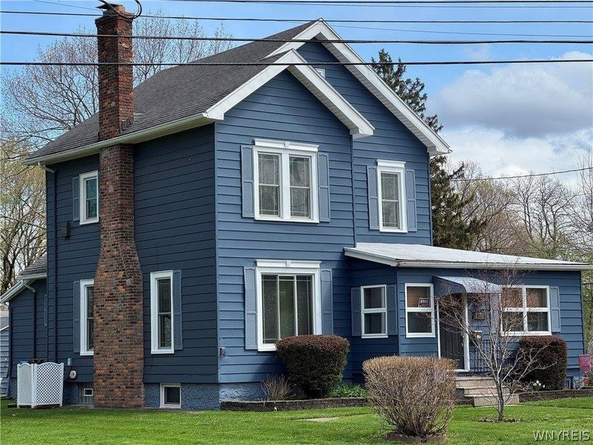 This charming four-bedroom 2 1/2 bath home is packed with - Beach Home for sale in Irondequoit, New York on Beachhouse.com