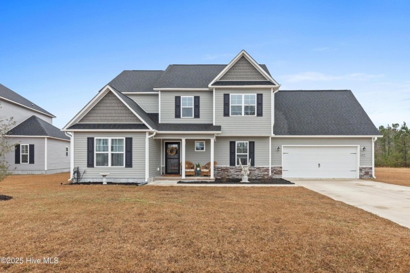 Welcome to Peyton's Lake! This beautifully crafted home is - Beach Home for sale in Hubert, North Carolina on Beachhouse.com