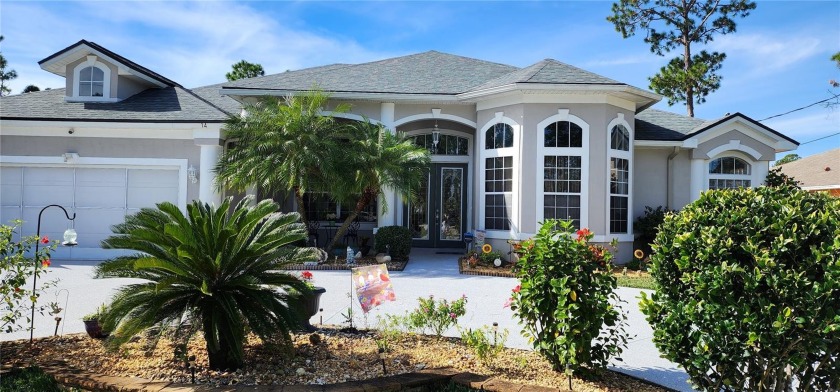 Magnificent 3 bedroom 2.5 bath home with pool/spa and 2 car - Beach Home for sale in Palm Coast, Florida on Beachhouse.com