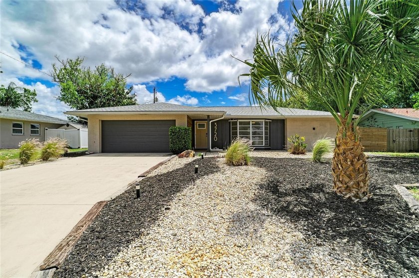 Welcome to this well-maintained, zen-inspired pool home in the - Beach Home for sale in Sarasota, Florida on Beachhouse.com