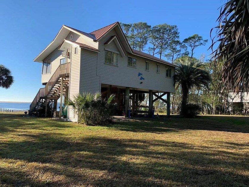 Sitting on the dock of the Bay. Literally. Here's your chance to - Beach Home for sale in Carabelle, Florida on Beachhouse.com
