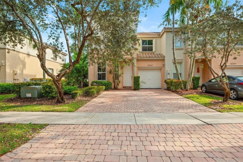 Discover this charming corner townhouse in the desirable gated - Beach Townhome/Townhouse for sale in Miramar, Florida on Beachhouse.com