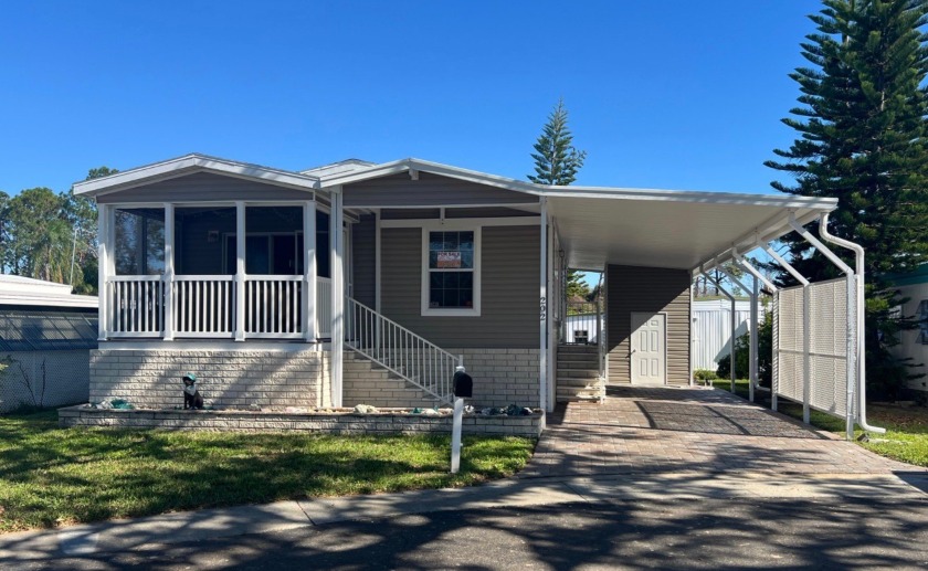 This home is only 10 years old, elevated, and located on a quiet - Beach Home for sale in Dunedin, Florida on Beachhouse.com