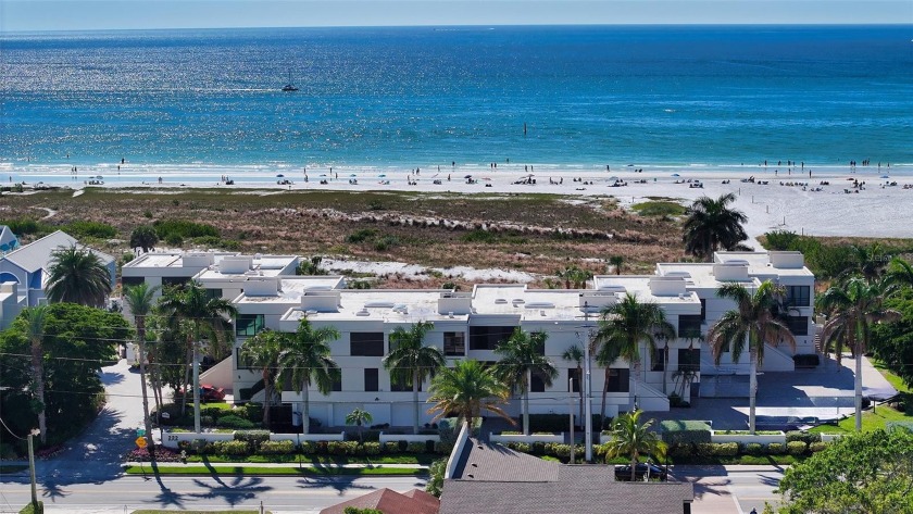 Priced below appraisal! Situated within an exclusive 10-unit - Beach Condo for sale in Sarasota, Florida on Beachhouse.com