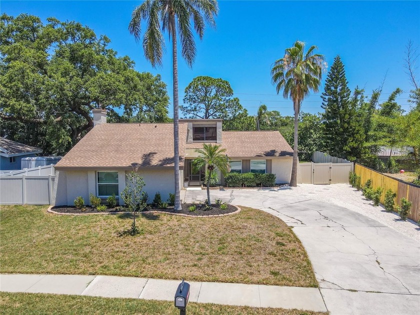 Experience the best of Florida living in this exceptional - Beach Home for sale in Palm Harbor, Florida on Beachhouse.com