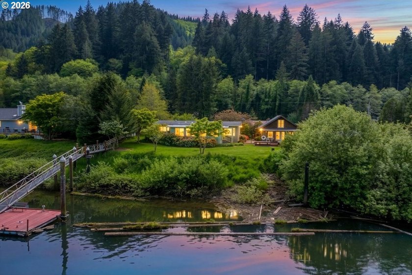 This rare riverfront retreat offers approximately 200 feet of - Beach Home for sale in Mapleton, Oregon on Beachhouse.com
