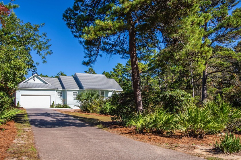 Nestled among mature, old-growth trees, this beautifully updated - Beach Home for sale in Santa Rosa Beach, Florida on Beachhouse.com