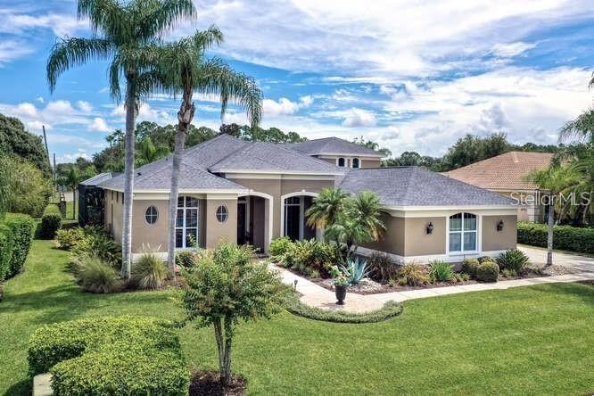 OVER 4,000 Sq FT in HIGHLY SOUGHT AFTER COMMUNITY OF LANSBROOK - Beach Home for sale in Palm Harbor, Florida on Beachhouse.com