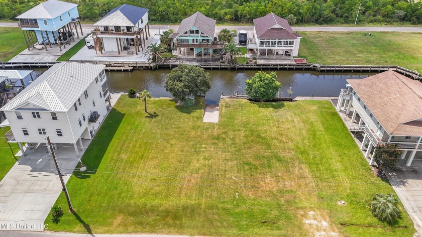 Discover the ultimate waterfront lifestyle with this exceptional - Beach Lot for sale in Bay Saint Louis, Mississippi on Beachhouse.com