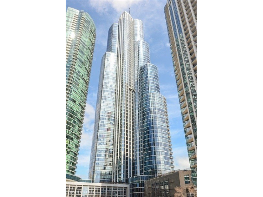 Experience elevated living in this stunning three bedroom, three - Beach Condo for sale in Chicago, Illinois on Beachhouse.com