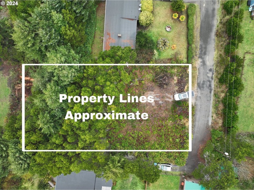 Located just minutes from beach access, this buildable lot - Beach Lot for sale in Waldport, Oregon on Beachhouse.com