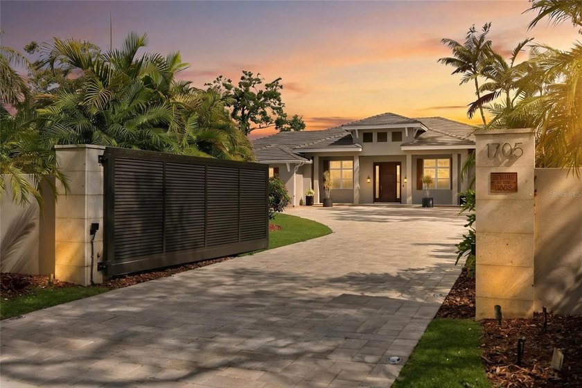 Under contract-accepting backup offers. Tucked behind a gate on - Beach Home for sale in Sarasota, Florida on Beachhouse.com
