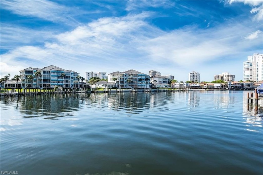 Sit at the pool and watch the sunsets over Venetian Village, in - Beach Home for sale in Naples, Florida on Beachhouse.com