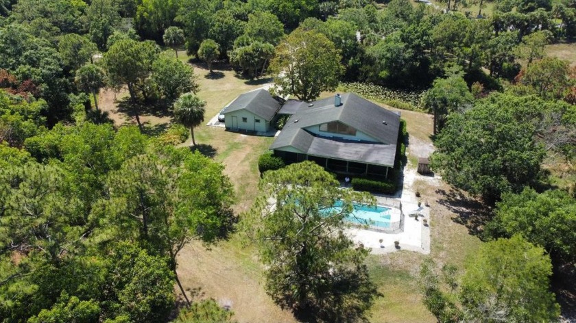 Rare 4.7 acre 4 bed 3 bath custom home with detached oversized - Beach Home for sale in Jupiter, Florida on Beachhouse.com