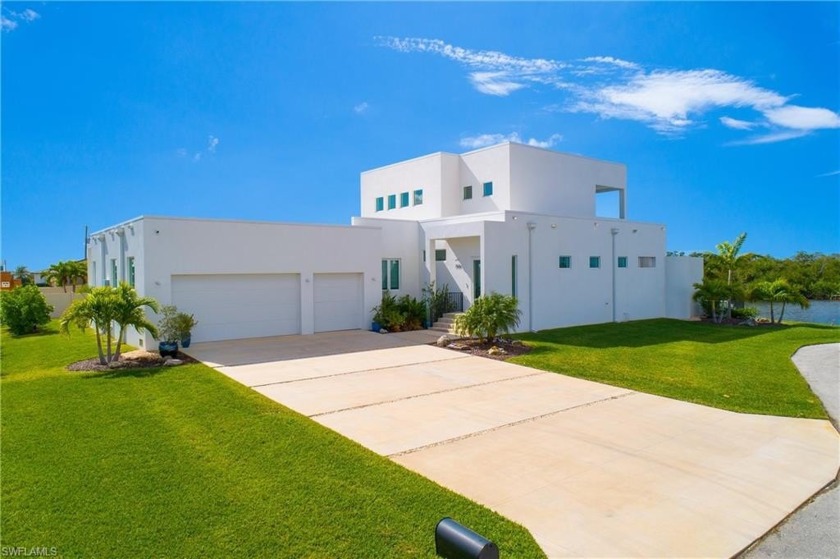 Nestled on a quiet lot looking westward over the Matlacha Pass - Beach Home for sale in Cape Coral, Florida on Beachhouse.com