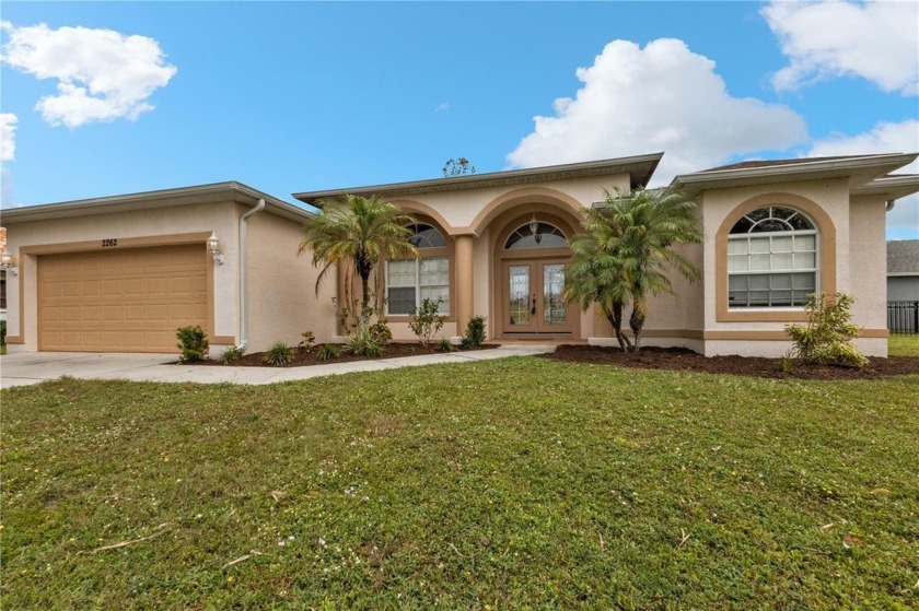 Fabulous Deep Creek POOL home! NEW ROOF, new paint and updated - Beach Home for sale in Punta Gorda, Florida on Beachhouse.com