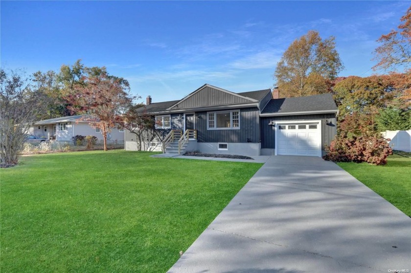 This newly renovated expanded ranch is a seaside gem with a - Beach Home for sale in Mattituck, New York on Beachhouse.com