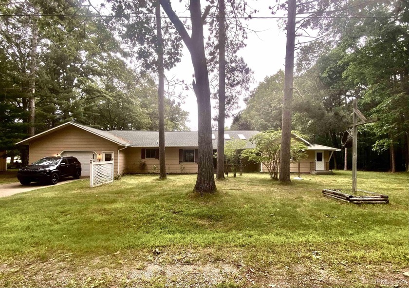 2 HOMES Situated on over 2 acres.  Main home features 1700plus - Beach Home for sale in Gladstone, Michigan on Beachhouse.com