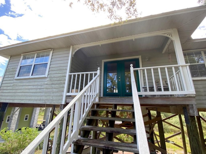 This charming island home is move in ready for you to begin - Beach Home for sale in Cedar Key, Florida on Beachhouse.com