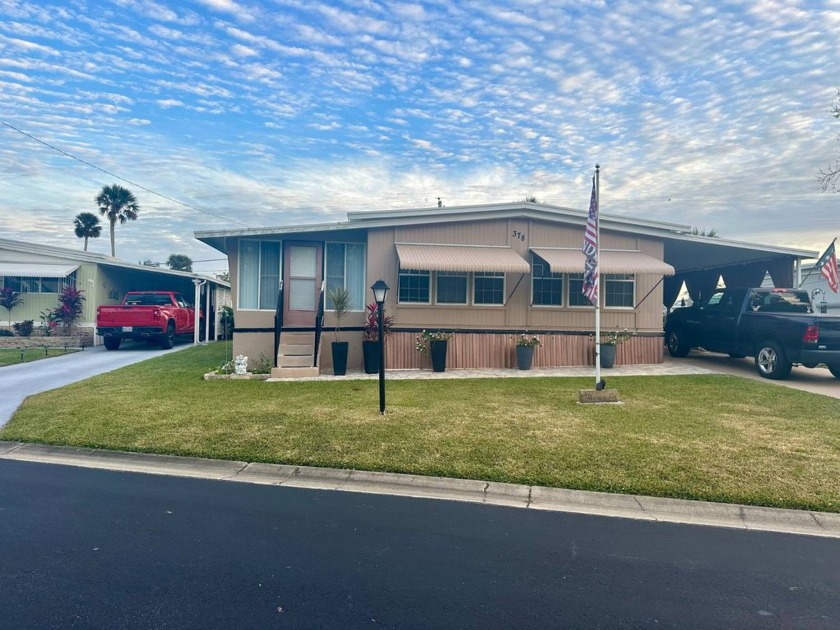 Nestled in a picturesque park setting, this beautifully updated - Beach Home for sale in South Daytona, Florida on Beachhouse.com