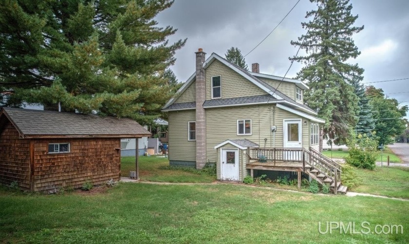 Welcome to this inviting corner-lot home in the Village of Lake - Beach Home for sale in Lake Linden, Michigan on Beachhouse.com