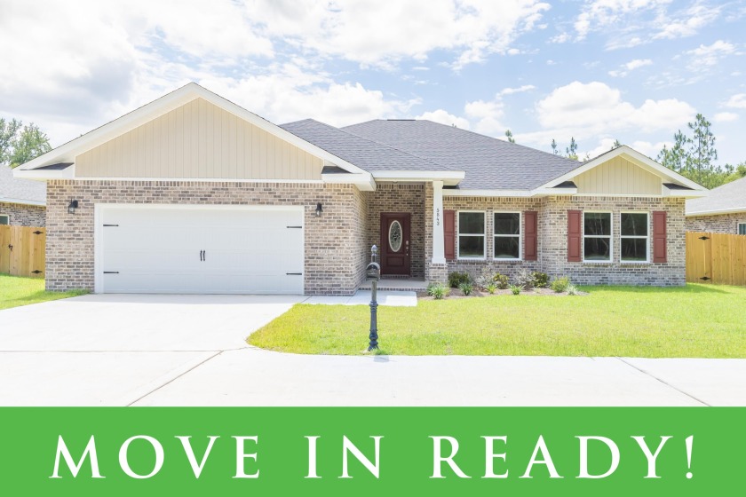 MOVE IN READY!  This 4 bedroom 2 bath split home is located in - Beach Home for sale in Milton, Florida on Beachhouse.com