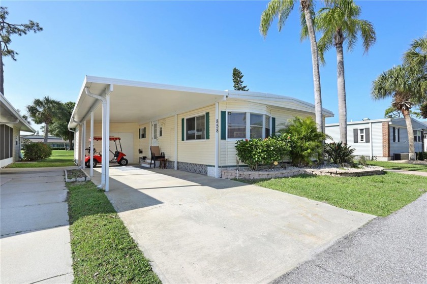 ON THE GOLF COURSE AND FANTASTIC NEW PRICE!  In a great location - Beach Home for sale in Punta Gorda, Florida on Beachhouse.com