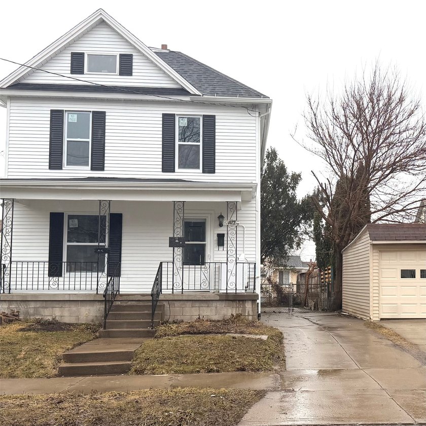 Step into this updated home featuring a living room, formal - Beach Home for sale in Erie, Pennsylvania on Beachhouse.com