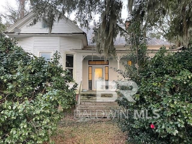 Perched atop a scenic bluff overlooking Mobile Bay, this - Beach Home for sale in Daphne, Alabama on Beachhouse.com