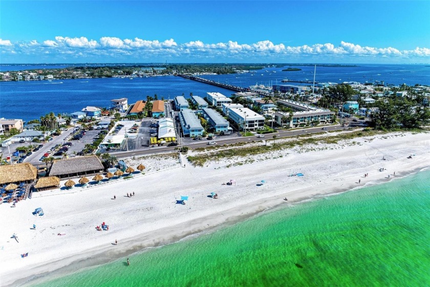 A true Gulf to Bay community on Anna Maria Island, this 2BR/1BA - Beach Condo for sale in Bradenton Beach, Florida on Beachhouse.com