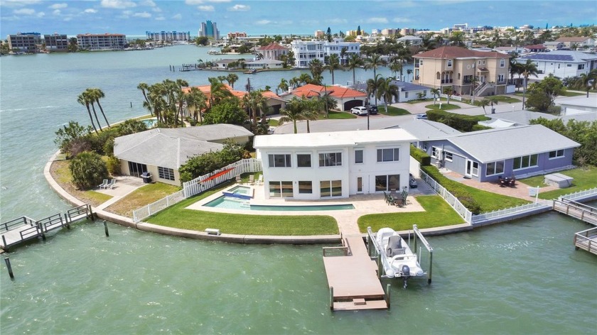 Nestled in the heart of St. Petersburg, this luxurious sanctuary - Beach Home for sale in Treasure Island, Florida on Beachhouse.com
