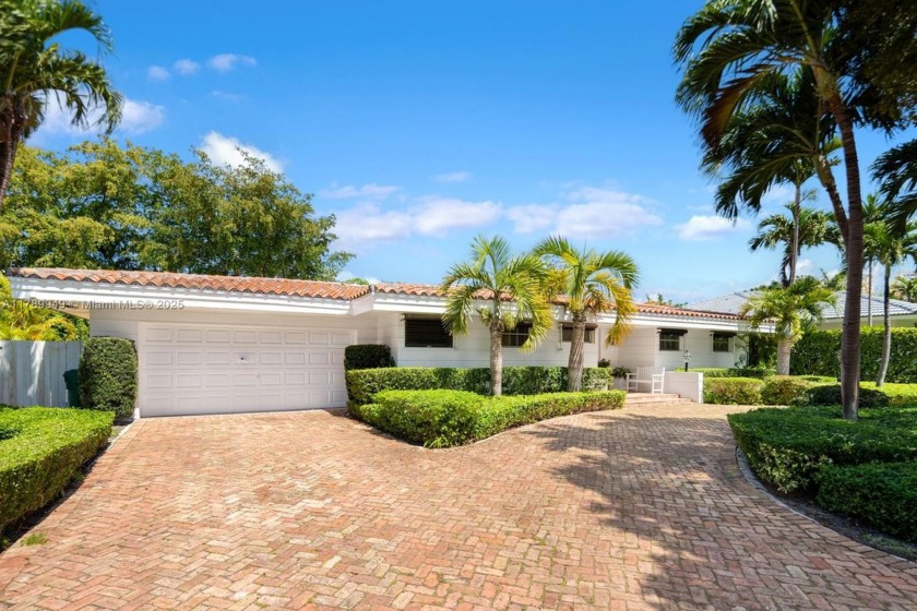 This home is nestled on the serene and picturesque Island Drive - Beach Home for sale in Key Biscayne, Florida on Beachhouse.com