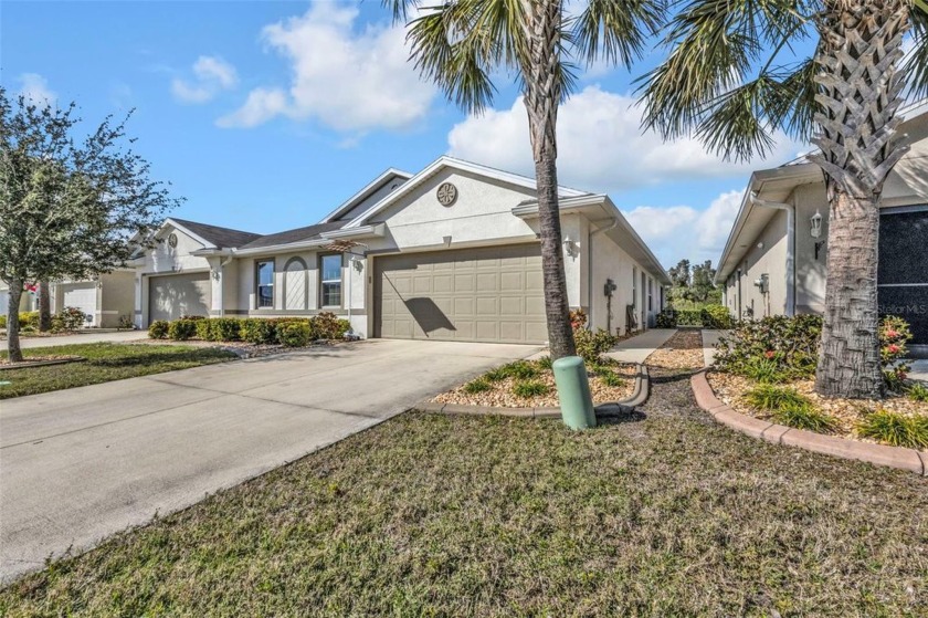 Beautiful LIKE NEW villa in desirable Waterford Estates awaits - Beach Home for sale in Punta Gorda, Florida on Beachhouse.com