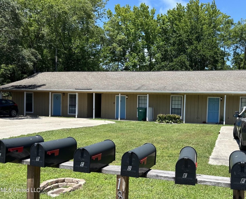 Income-producing, tenant-occupied 6 unit duplex in the sought - Beach Home for sale in Long Beach, Mississippi on Beachhouse.com