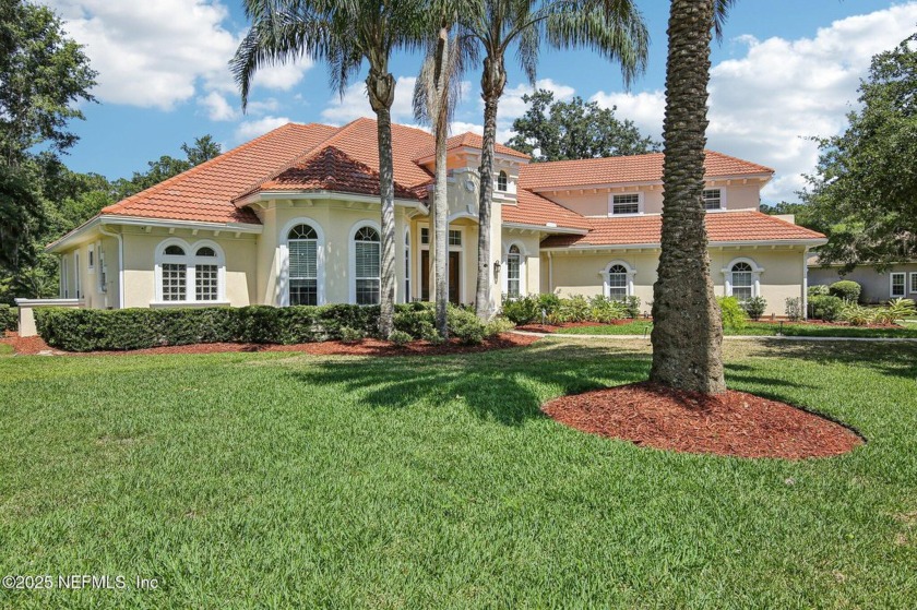 Mediterranean executive 4-bed, 3-bath pool home with tile roof - Beach Home for sale in Fleming Island, Florida on Beachhouse.com